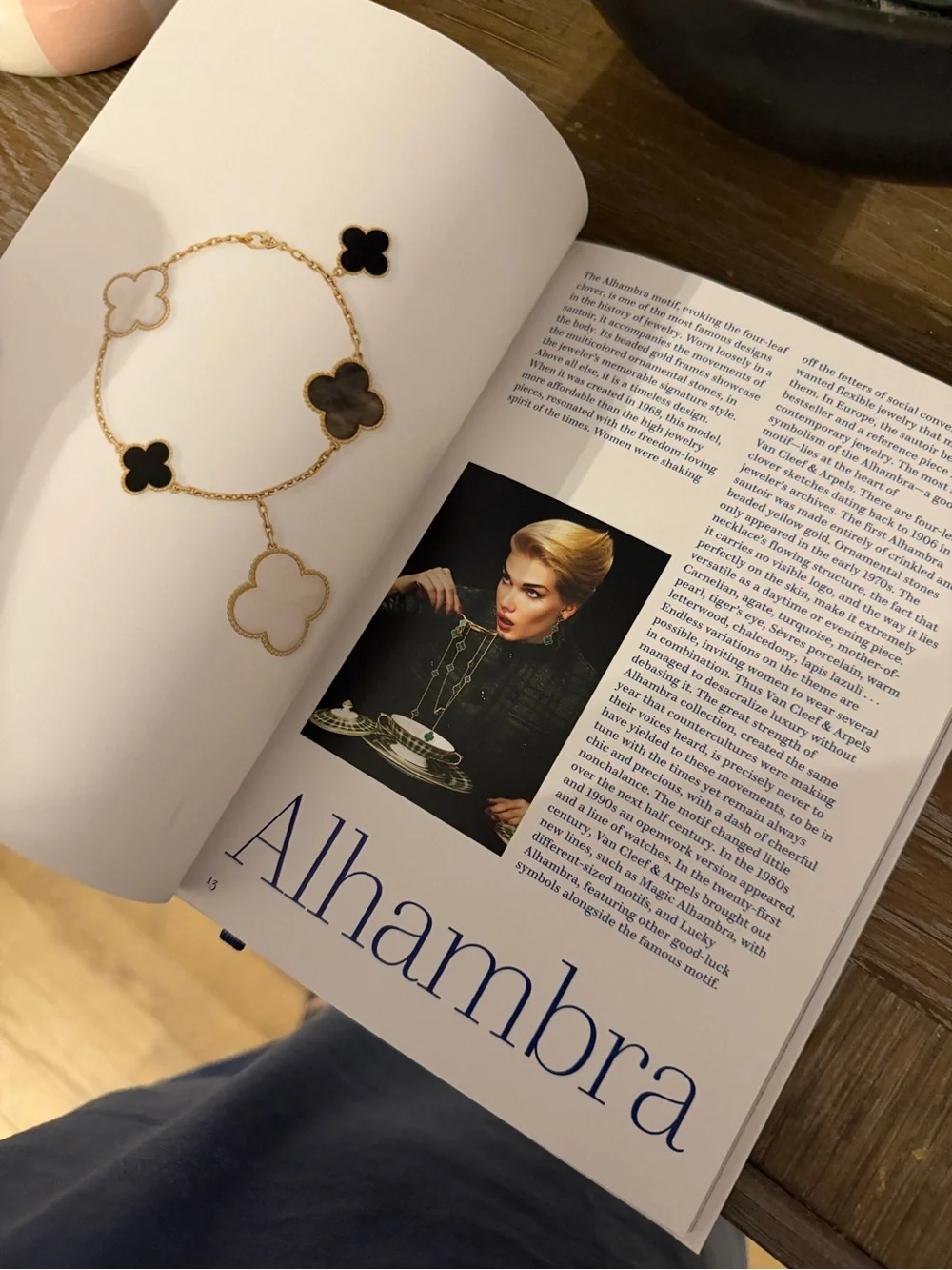 Van Cleef & Arpels White Book with Blue Title and Red Illustration